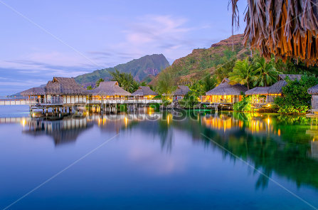 stock-photo-overwater-bungalows-at-dusk-french-polynesia-121649683