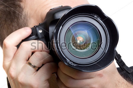 stock-photo-photographer-taking-pictures-with-digital-camera-over-white-background-116021755?ref=1090238