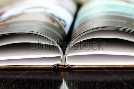 stock-photo-photo-book-on-table-221504479