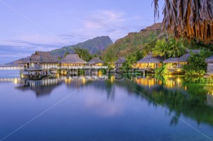 stock-photo-overwater-bungalows-at-dusk-french-polynesia-121649683