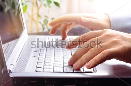 stock-photo-businessman-typing-on-laptop-keyboard-113554756